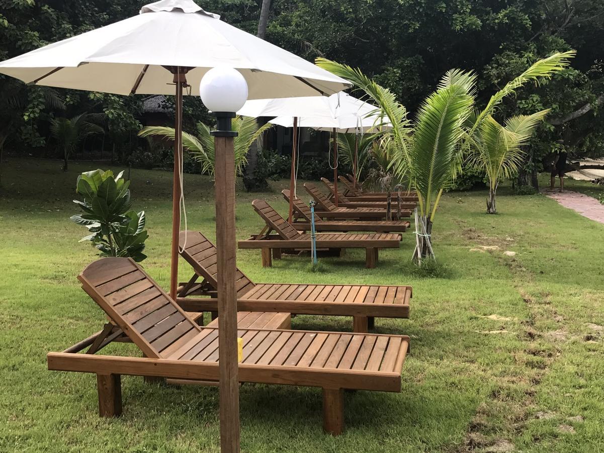 Paradise Beachfront Bungalows Hotel เกาะกระดาน ภายนอก รูปภาพ